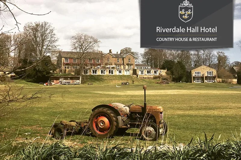 And old tractor sits by the cricket ground in front of the hotel.